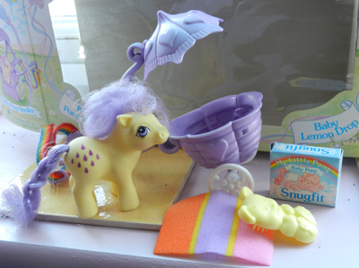 baby pony
          with purple stroller, box and accessories