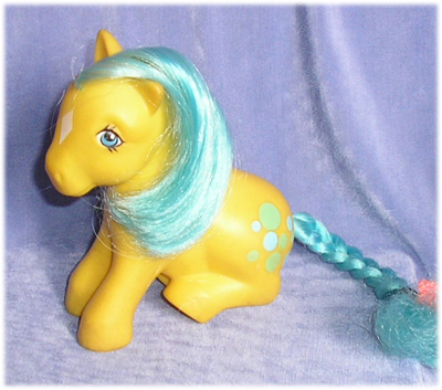 Yellow sitting pony