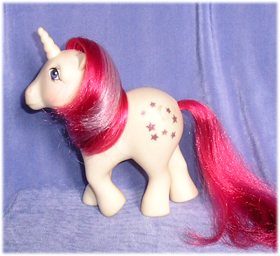 white
          unicorn with moon and stars symbol