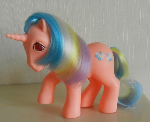 Orange
          unicorn with blue, white, yellow and purple hair, skates
          symbol