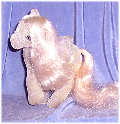 Purple
          pegasus with fading pink hair, candle in holder